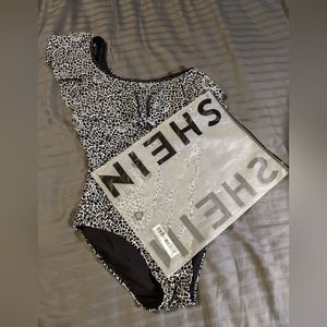 Shein women's one piece...size medium